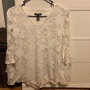 Size small, great shirt to wear to church or brunch!